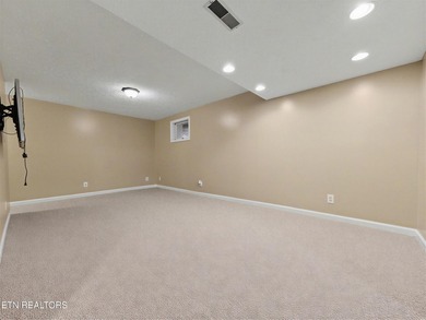 Want a comfortable cabin at the lake? This home offers wooded on The Greens at Deerfield in Tennessee - for sale on GolfHomes.com, golf home, golf lot