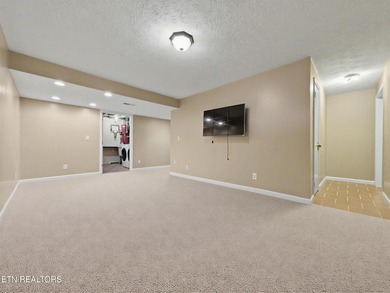 Want a comfortable cabin at the lake? This home offers wooded on The Greens at Deerfield in Tennessee - for sale on GolfHomes.com, golf home, golf lot