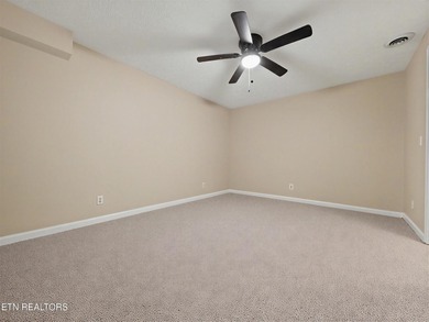 Want a comfortable cabin at the lake? This home offers wooded on The Greens at Deerfield in Tennessee - for sale on GolfHomes.com, golf home, golf lot