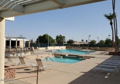 Welcome to this charming 2-bed, 2-bath home on the walking path on Sun Lakes Country Club in Arizona - for sale on GolfHomes.com, golf home, golf lot