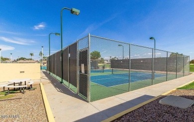 Welcome to this charming 2-bed, 2-bath home on the walking path on Sun Lakes Country Club in Arizona - for sale on GolfHomes.com, golf home, golf lot