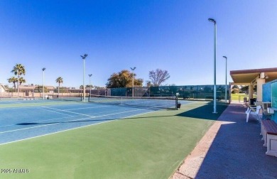 Welcome to this charming 2-bed, 2-bath home on the walking path on Sun Lakes Country Club in Arizona - for sale on GolfHomes.com, golf home, golf lot