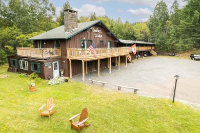 GREAT Location with this Adirondack Motel that offers six cabin on Tupper Lake Country Club in New York - for sale on GolfHomes.com, golf home, golf lot