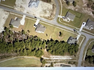 Beautiful .61 acre located adjacent to the #2 T Box Par 3 in on Windswept Dunes Golf Club in Florida - for sale on GolfHomes.com, golf home, golf lot