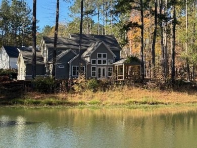 Located in Harbor Club on Lake Oconee, this Emmeline plan by on Harbor Club Golf and Country Club in Georgia - for sale on GolfHomes.com, golf home, golf lot