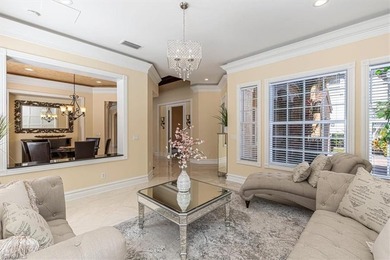 This beautifully maintained 4-bed plus den, 4-bath residence in on Valencia Golf and Country Club in Florida - for sale on GolfHomes.com, golf home, golf lot