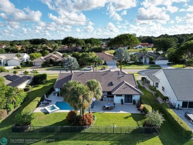 Welcome to this fully renovated 4 bedroom 2.5 bath home in Boca on Boca Woods Country Club in Florida - for sale on GolfHomes.com, golf home, golf lot