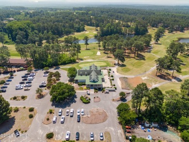 Golf front 2-bedroom condo located in Foxfire overlooking the on Foxfire Golf and Country Club in North Carolina - for sale on GolfHomes.com, golf home, golf lot