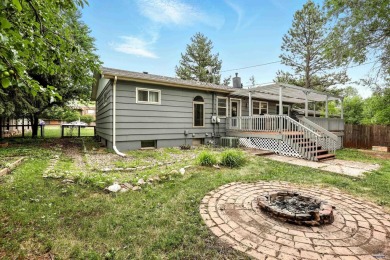 Welcome home to this spacious and full-of-character 5-bedroom on Meadowbrook Golf Course in South Dakota - for sale on GolfHomes.com, golf home, golf lot