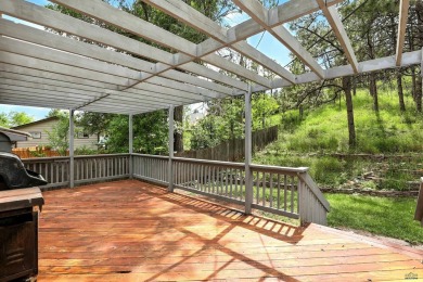 Welcome home to this spacious and full-of-character 5-bedroom on Meadowbrook Golf Course in South Dakota - for sale on GolfHomes.com, golf home, golf lot