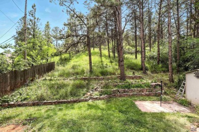 Welcome home to this spacious and full-of-character 5-bedroom on Meadowbrook Golf Course in South Dakota - for sale on GolfHomes.com, golf home, golf lot