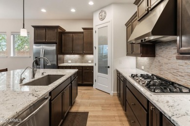 Situated with views of the picturesque tee box of Hole 7 at the on Blackstone Country Club in Arizona - for sale on GolfHomes.com, golf home, golf lot