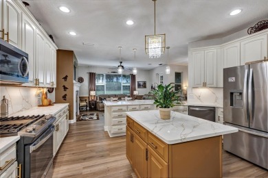 Affordable Low-Maintenance Stucco Home in Guard Gated, Active on Arlington Ridge Golf Club in Florida - for sale on GolfHomes.com, golf home, golf lot