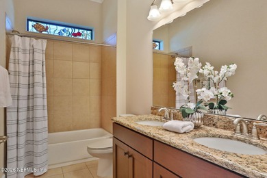 Resort-style living on a premium cul-de-sac lot overlooking the on The Palencia Club in Florida - for sale on GolfHomes.com, golf home, golf lot