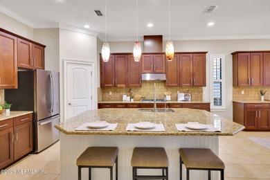 Resort-style living on a premium cul-de-sac lot overlooking the on The Palencia Club in Florida - for sale on GolfHomes.com, golf home, golf lot