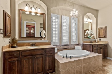 This exquisite, customized Drees one-story brick and stone on Lantana Golf Club in Texas - for sale on GolfHomes.com, golf home, golf lot