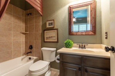 This exquisite, customized Drees one-story brick and stone on Lantana Golf Club in Texas - for sale on GolfHomes.com, golf home, golf lot