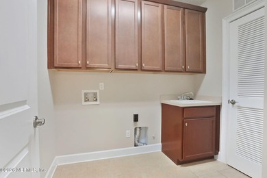 Resort-style living on a premium cul-de-sac lot overlooking the on The Palencia Club in Florida - for sale on GolfHomes.com, golf home, golf lot