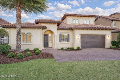 Resort-style living on a premium cul-de-sac lot overlooking the on The Palencia Club in Florida - for sale on GolfHomes.com, golf home, golf lot