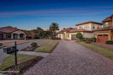 Resort-style living on a premium cul-de-sac lot overlooking the on The Palencia Club in Florida - for sale on GolfHomes.com, golf home, golf lot