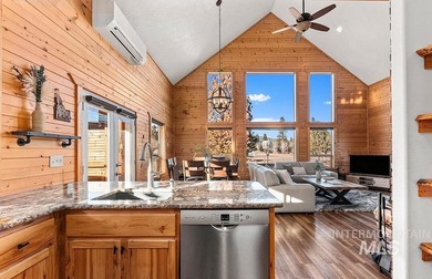 Custom-built timber cabin on over an acre with a 3-car garage on Terrace Lakes Golf Resort in Idaho - for sale on GolfHomes.com, golf home, golf lot