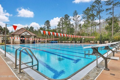 Resort-style living on a premium cul-de-sac lot overlooking the on The Palencia Club in Florida - for sale on GolfHomes.com, golf home, golf lot