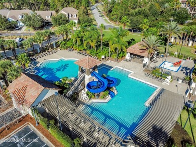 Resort-style living on a premium cul-de-sac lot overlooking the on The Palencia Club in Florida - for sale on GolfHomes.com, golf home, golf lot