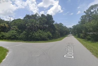 Build your dream home on this 0.28-acre lot in Port Charlotte on on Sabal Trace Golf and Country Club in Florida - for sale on GolfHomes.com, golf home, golf lot