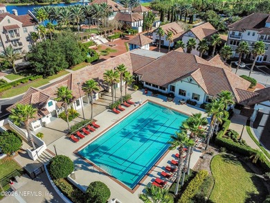 Resort-style living on a premium cul-de-sac lot overlooking the on The Palencia Club in Florida - for sale on GolfHomes.com, golf home, golf lot