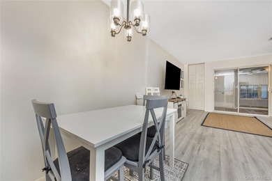 Enjoy low maintenance living in this bright and updated one on Leisure Village Golf Course in New York - for sale on GolfHomes.com, golf home, golf lot