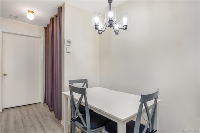 Enjoy low maintenance living in this bright and updated one on Leisure Village Golf Course in New York - for sale on GolfHomes.com, golf home, golf lot