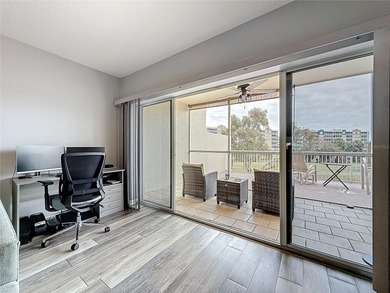 Country Club Condo at East Bay - Discover elevated, carefree on East Bay Golf Club in Florida - for sale on GolfHomes.com, golf home, golf lot