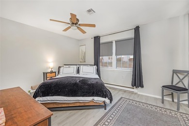 Enjoy low maintenance living in this bright and updated one on Leisure Village Golf Course in New York - for sale on GolfHomes.com, golf home, golf lot