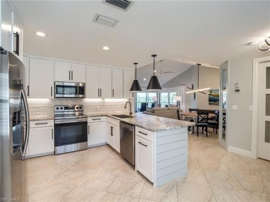 This condo will WOW you!  Totally updated with CONTEMPORARY on Estero Country Club in Florida - for sale on GolfHomes.com, golf home, golf lot