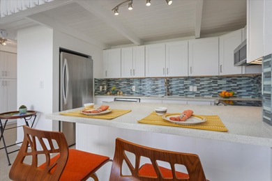 Step into this top floor condo and you'll be immediately drawn on Waikoloa Village Golf Club in Hawaii - for sale on GolfHomes.com, golf home, golf lot