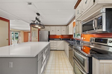 Welcome to exceptional resort-style living in Zellwood Station on Zellwood Station Country Club in Florida - for sale on GolfHomes.com, golf home, golf lot