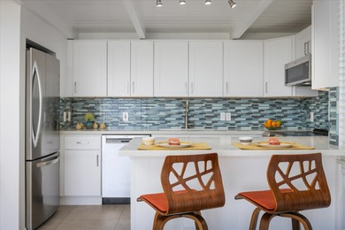 Step into this top floor condo and you'll be immediately drawn on Waikoloa Village Golf Club in Hawaii - for sale on GolfHomes.com, golf home, golf lot