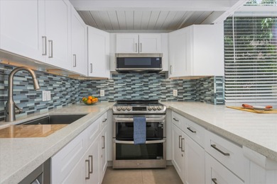 Step into this top floor condo and you'll be immediately drawn on Waikoloa Village Golf Club in Hawaii - for sale on GolfHomes.com, golf home, golf lot