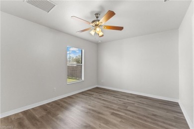 Welcome to your dream home!  As you step inside, you'll be on Bobcat Trail Golf Club in Florida - for sale on GolfHomes.com, golf home, golf lot