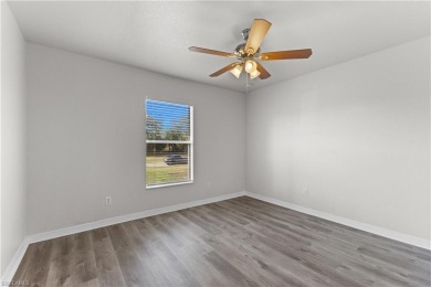 Welcome to your dream home!  As you step inside, you'll be on Bobcat Trail Golf Club in Florida - for sale on GolfHomes.com, golf home, golf lot