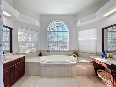 Welcome to this model perfect home in the Estates of Beacon on The Links Golf Course in Florida - for sale on GolfHomes.com, golf home, golf lot