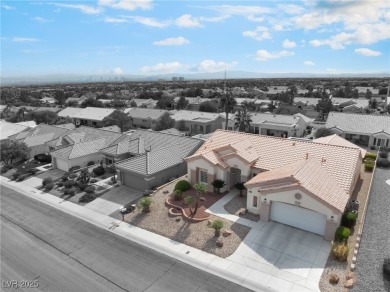 Welcome to your desert oasis in the heart of Sun City Summerlin! on Highland Falls Golf Club in Nevada - for sale on GolfHomes.com, golf home, golf lot
