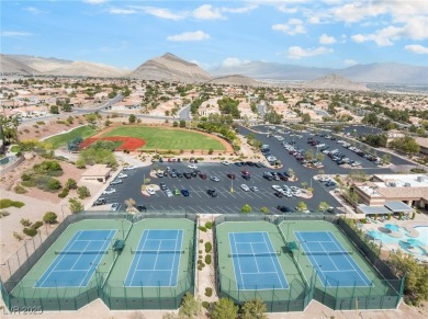 Welcome to your desert oasis in the heart of Sun City Summerlin! on Highland Falls Golf Club in Nevada - for sale on GolfHomes.com, golf home, golf lot