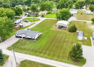 3 LOTS!!! The 3br 2 Ba updated in Rustic decor home is located on Linn Valley Lakes - Deer Trace Golf Course in Kansas - for sale on GolfHomes.com, golf home, golf lot