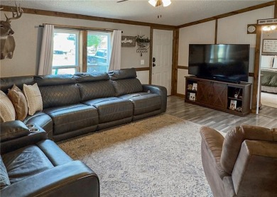 3 LOTS!!! The 3br 2 Ba updated in Rustic decor home is located on Linn Valley Lakes - Deer Trace Golf Course in Kansas - for sale on GolfHomes.com, golf home, golf lot