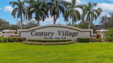 BEAUTIFUL 2 BEDROOMS 2 BATHROOMS LARGE UNIT OVERLOOKING A G0LG on Flamingo Lakes Country Club in Florida - for sale on GolfHomes.com, golf home, golf lot