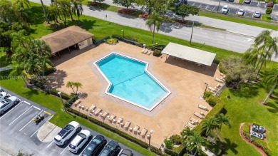 BEAUTIFUL 2 BEDROOMS 2 BATHROOMS LARGE UNIT OVERLOOKING A G0LG on Flamingo Lakes Country Club in Florida - for sale on GolfHomes.com, golf home, golf lot