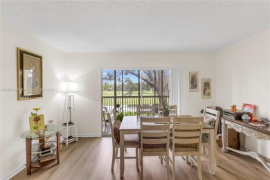 BEAUTIFUL 2 BEDROOMS 2 BATHROOMS LARGE UNIT OVERLOOKING A G0LG on Flamingo Lakes Country Club in Florida - for sale on GolfHomes.com, golf home, golf lot