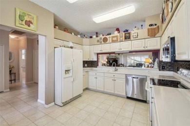 SUPER STRATFORD V MODEL HOME WITH A PRIVATE SETTING IN A on Heritage Pines Country Club in Florida - for sale on GolfHomes.com, golf home, golf lot