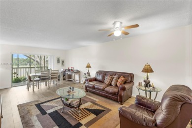 BEAUTIFUL 2 BEDROOMS 2 BATHROOMS LARGE UNIT OVERLOOKING A G0LG on Flamingo Lakes Country Club in Florida - for sale on GolfHomes.com, golf home, golf lot